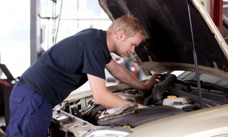 Mechanic Fixing Car