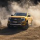 2022Ford_NextGenRanger_Wildtrak_Front3QTR_motion_sand