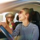 Smiling,Happy,Young,Woman,Giving,Her,Friend,A,Lift,In